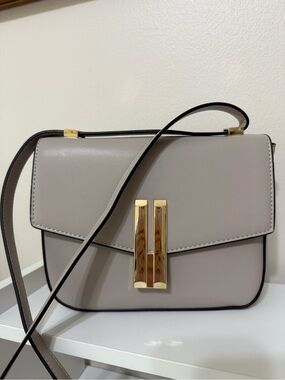 Taupe Gray Crossbody shoulder bag with gold tone hardware